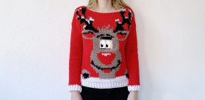 Digital Reindeer Christmas Sweater - Here are 13 free crochet sweater patterns for the holiday season, including adorable outfits for baby, and out-of-this-world ugly Christmas sweaters! #freecrochetsweaterpatterns #crochetpatterns #crochetsweaters