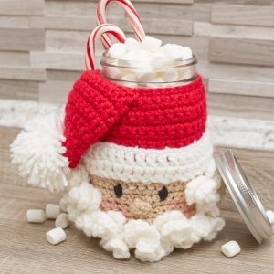 Red Heart Santa Candy Jar - This list of free crochet patterns has some fun Christmas decorations that will deck your halls and bring jolly to your days! #crochetpatterns #christmascrochetpatterns #holidaycrochetpatterns