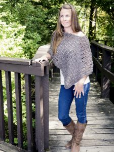 Asymmetrical Poncho - These free crochet poncho patterns may be used this winter, but many of the designs here can also work up to spring and even on a cool summer day! #freecrochetponchopatterns #crochetponcho #crochetpatterns