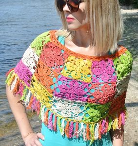 Crochet Summer Poncho - These free crochet poncho patterns may be used this winter, but many of the designs here can also work up to spring and even on a cool summer day! #freecrochetponchopatterns #crochetponcho #crochetpatterns