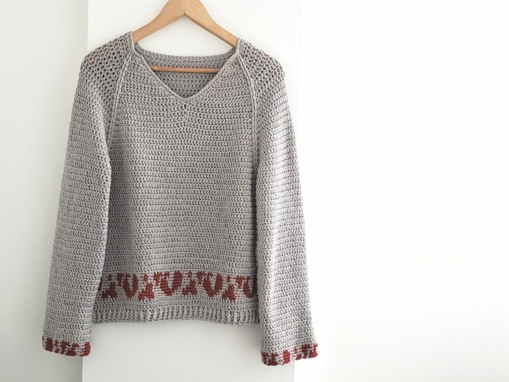 bandia crochet sweater that  features a bit of animal print 