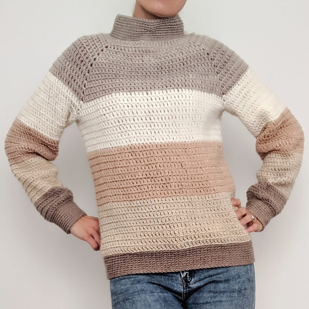 a woman wearing the Karamell Crochet Sweater