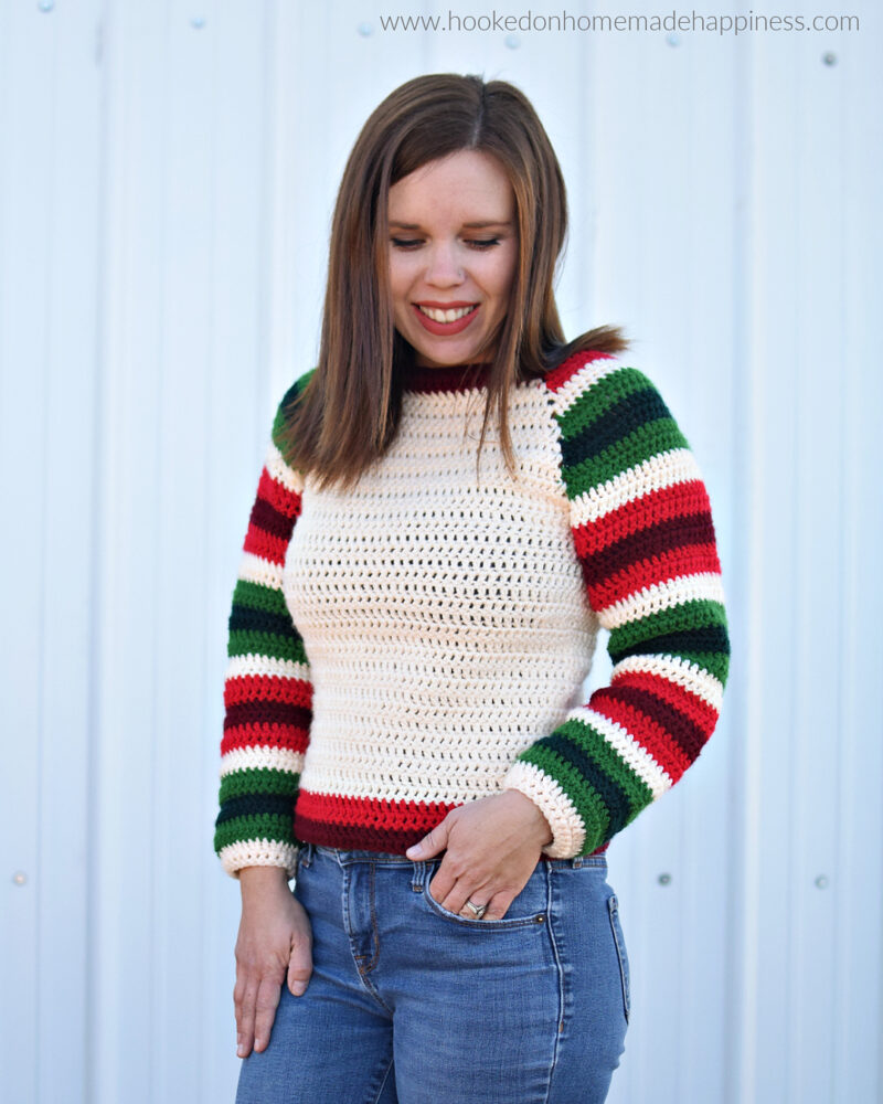 a woman wearing the Mod Christmas Crochet Sweater
