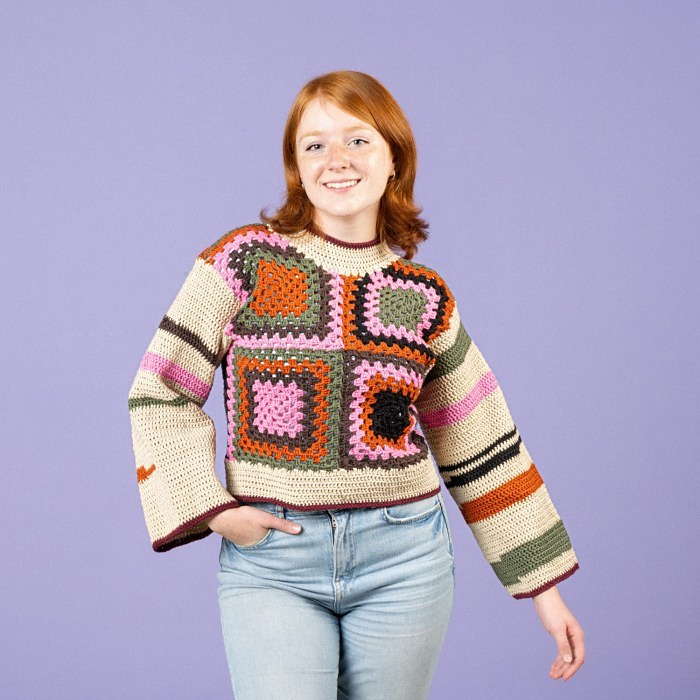 a woman wearing the Noona Crochet Sweater
