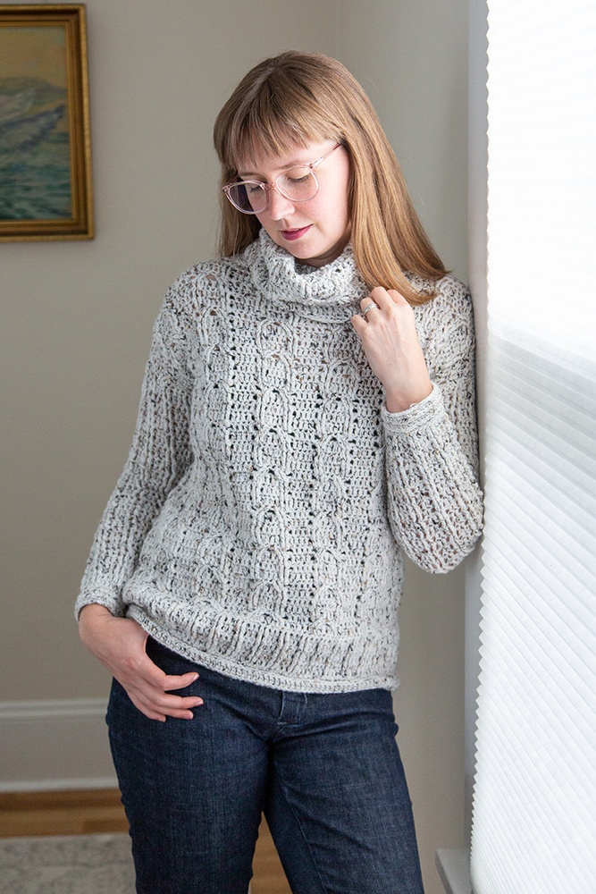 a woman wearing the Washington Park Cowl-Neck Sweater