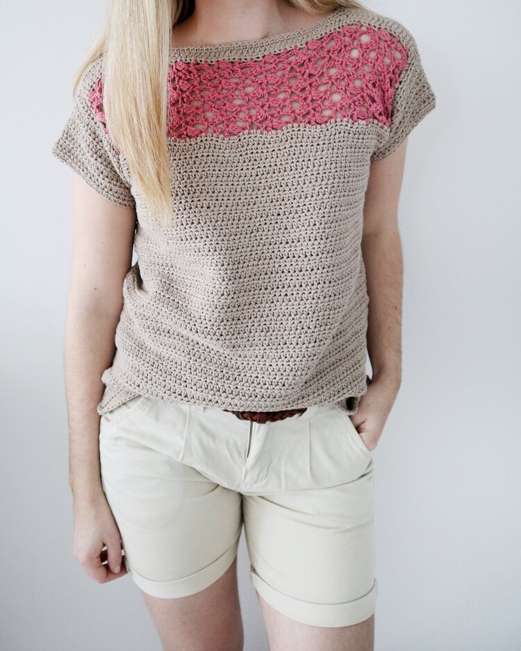 a girl wearing a crochet tee designed with beautifully made lace 
