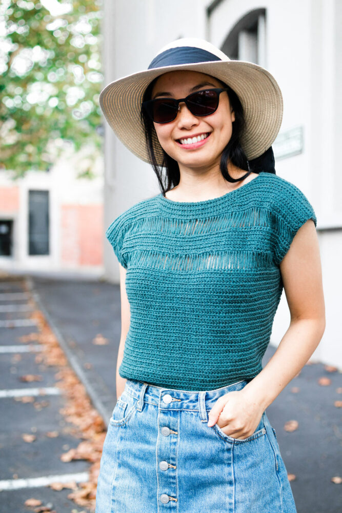 a girl wearing the Crochet Summer Stream Tee