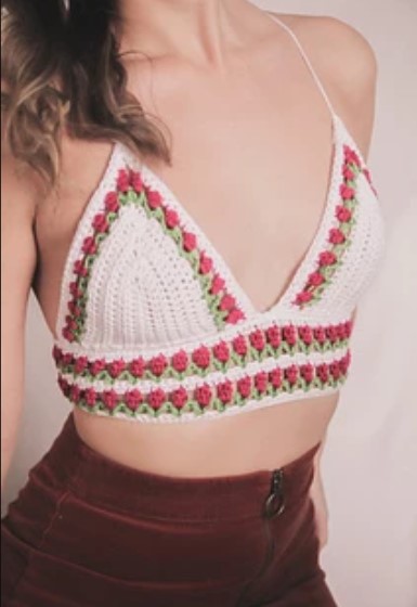 a woman wearing the Tulip Crochet Crop Top