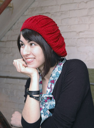 A woman wearing the Phannie Crochet Beret 