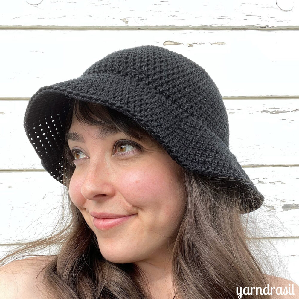 A woman wearing the Seamless Crochet Bucket Hat