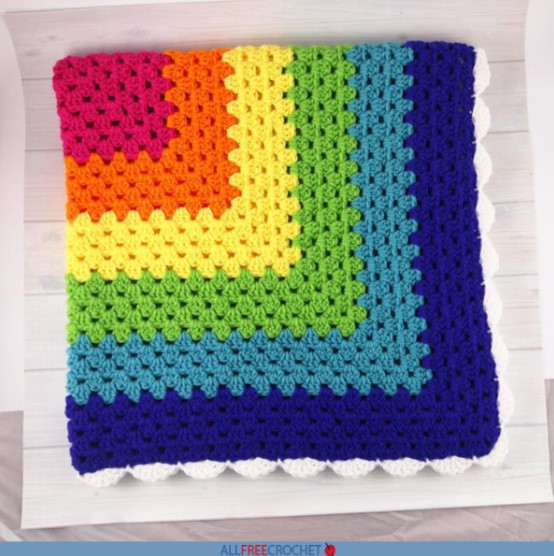 folded rainbow granny square crochet blanket